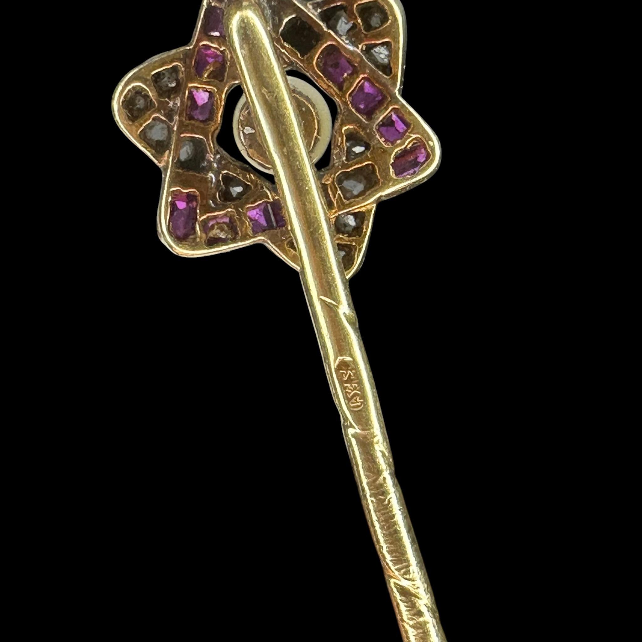 rear view of Antique Ruby Diamond & Pearl Star Stick Pin with black background