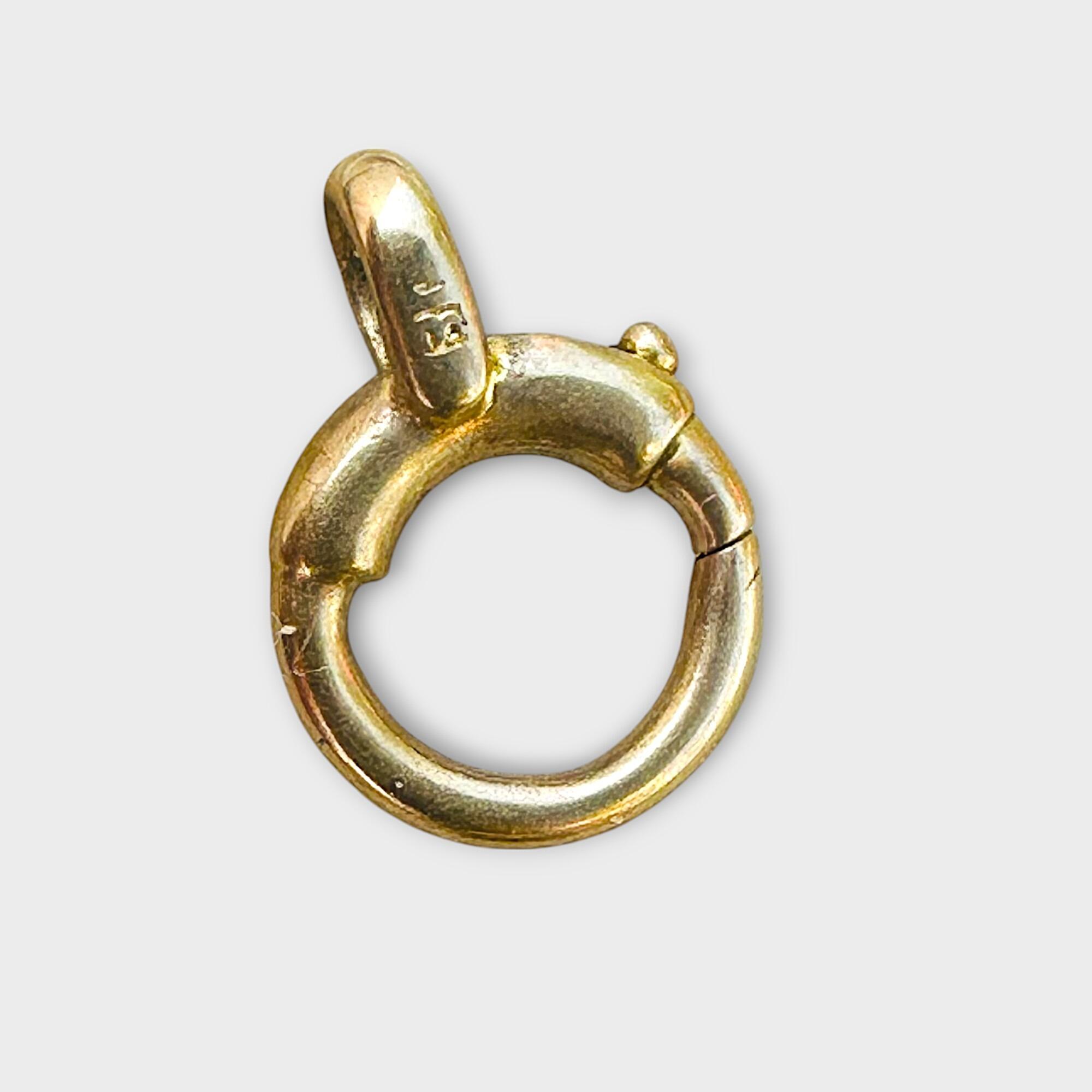 Victorian 18k yellow gold bolt ring clasp with antique patina, measuring 8x11.5mm on grey background.