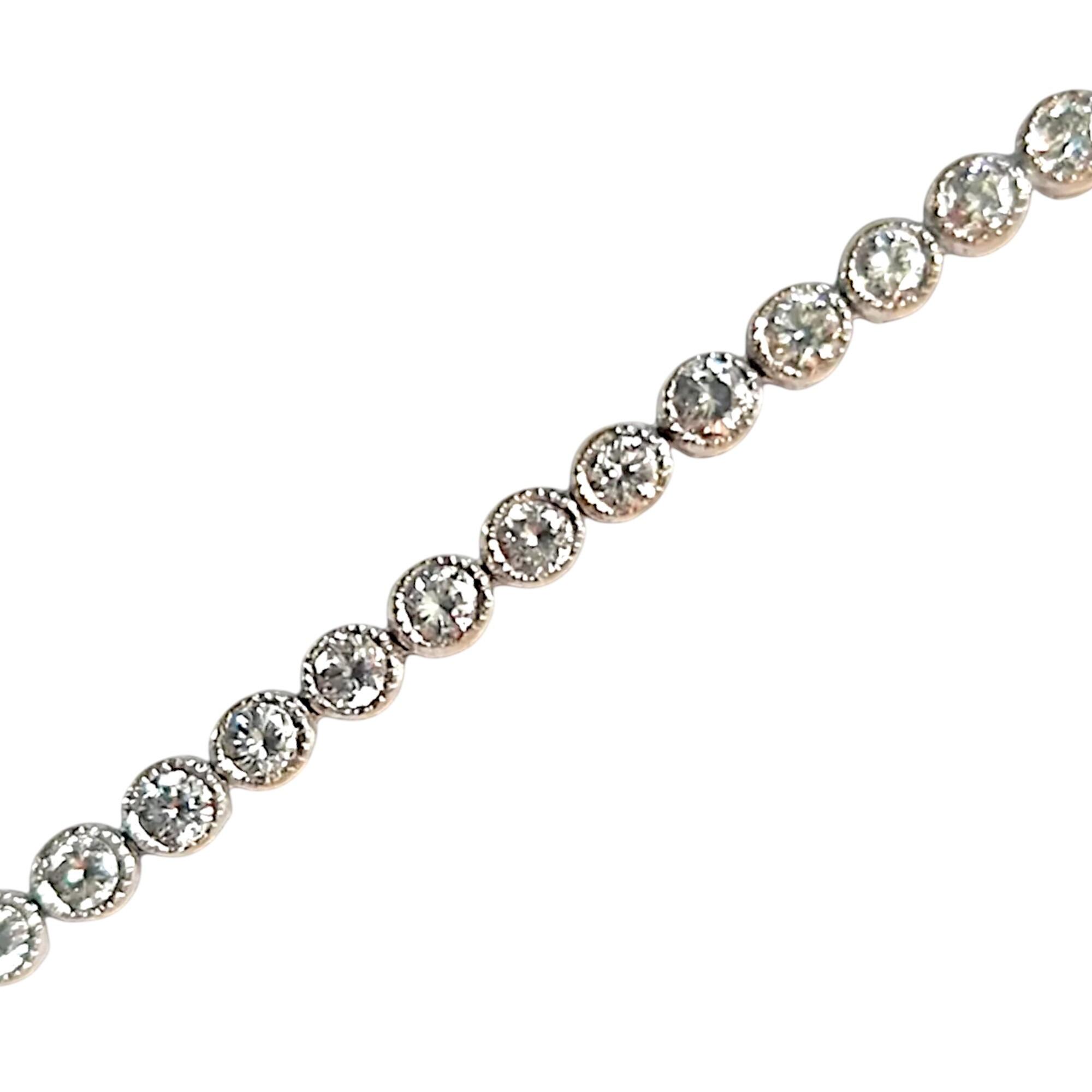 modern 18k white gold and diamond tennis, line bracelet