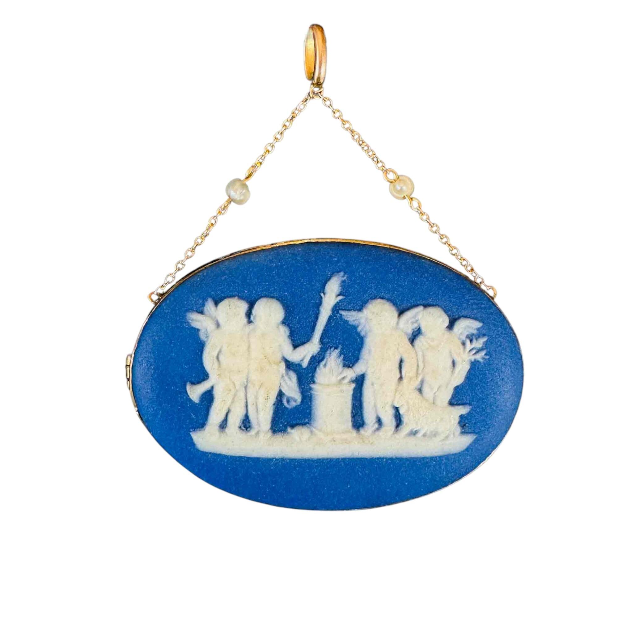 A Sacrifice to Hymen' Wedgwood indigo jasperware 9ct gold pendant with chain connector