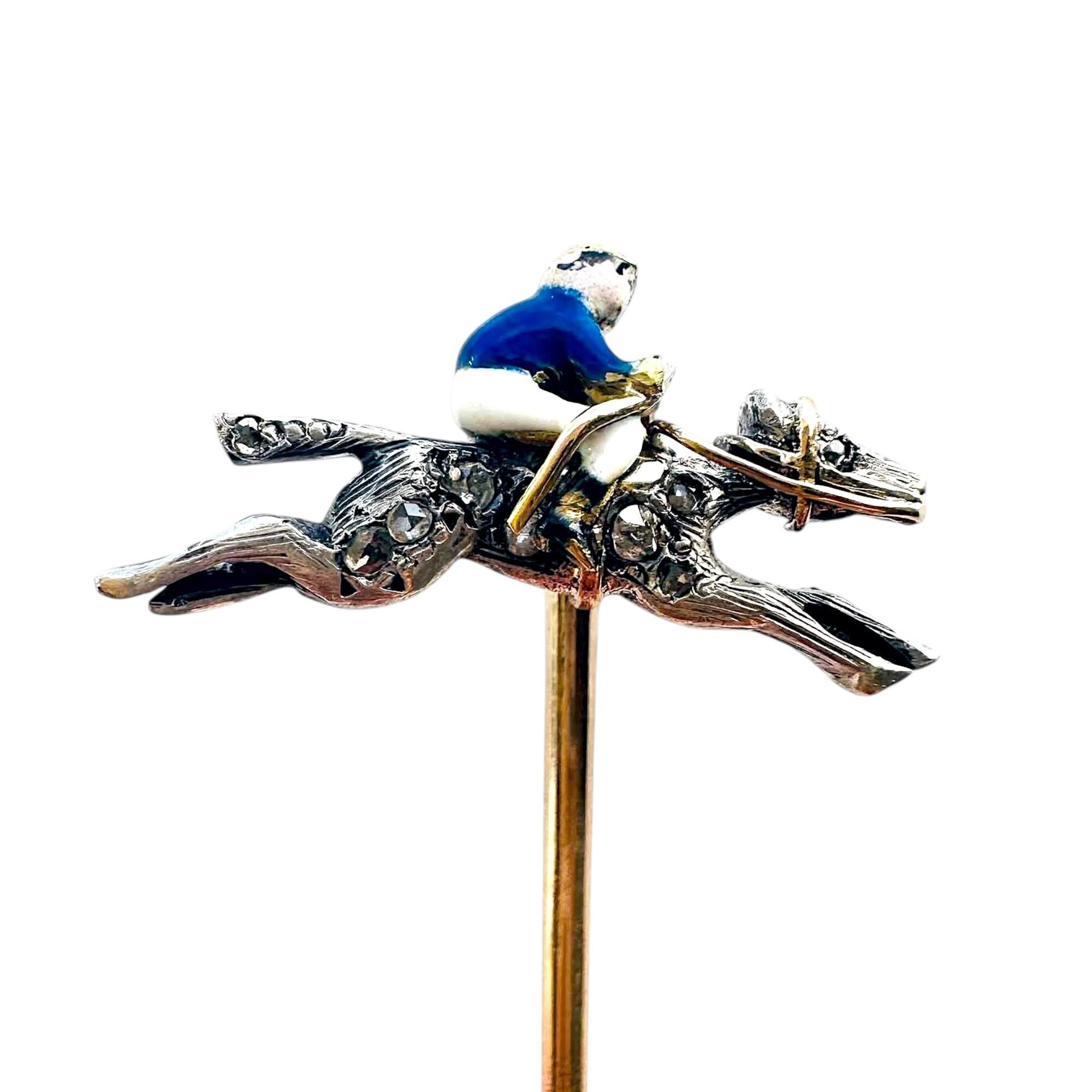 stickpin with enamel jockey on a diamond studded racehorse