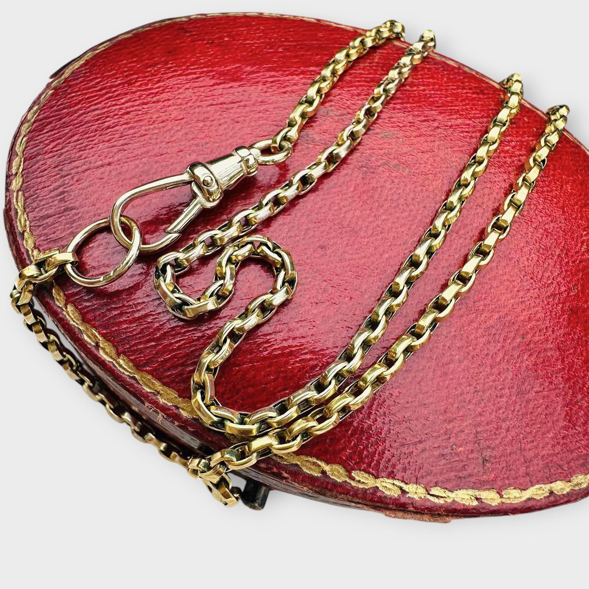 Antique 9k yellow gold bike link chain necklace with dog clip clasp, 19.5 inches long, on red antique box.