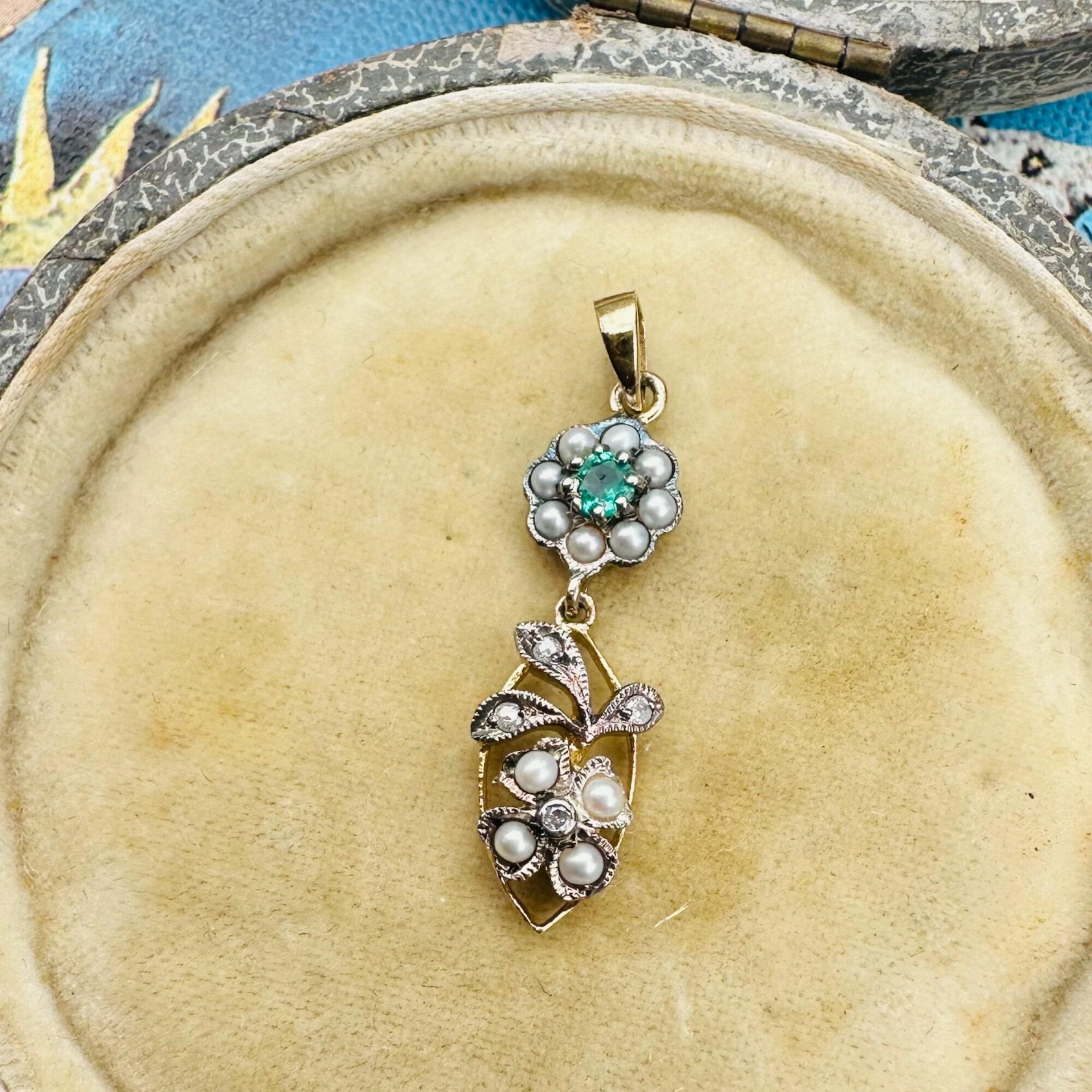close up, Edwardian Style Emerald, Pearl & Diamond Pendant in Silver & 9k Gold displayed in antique box.