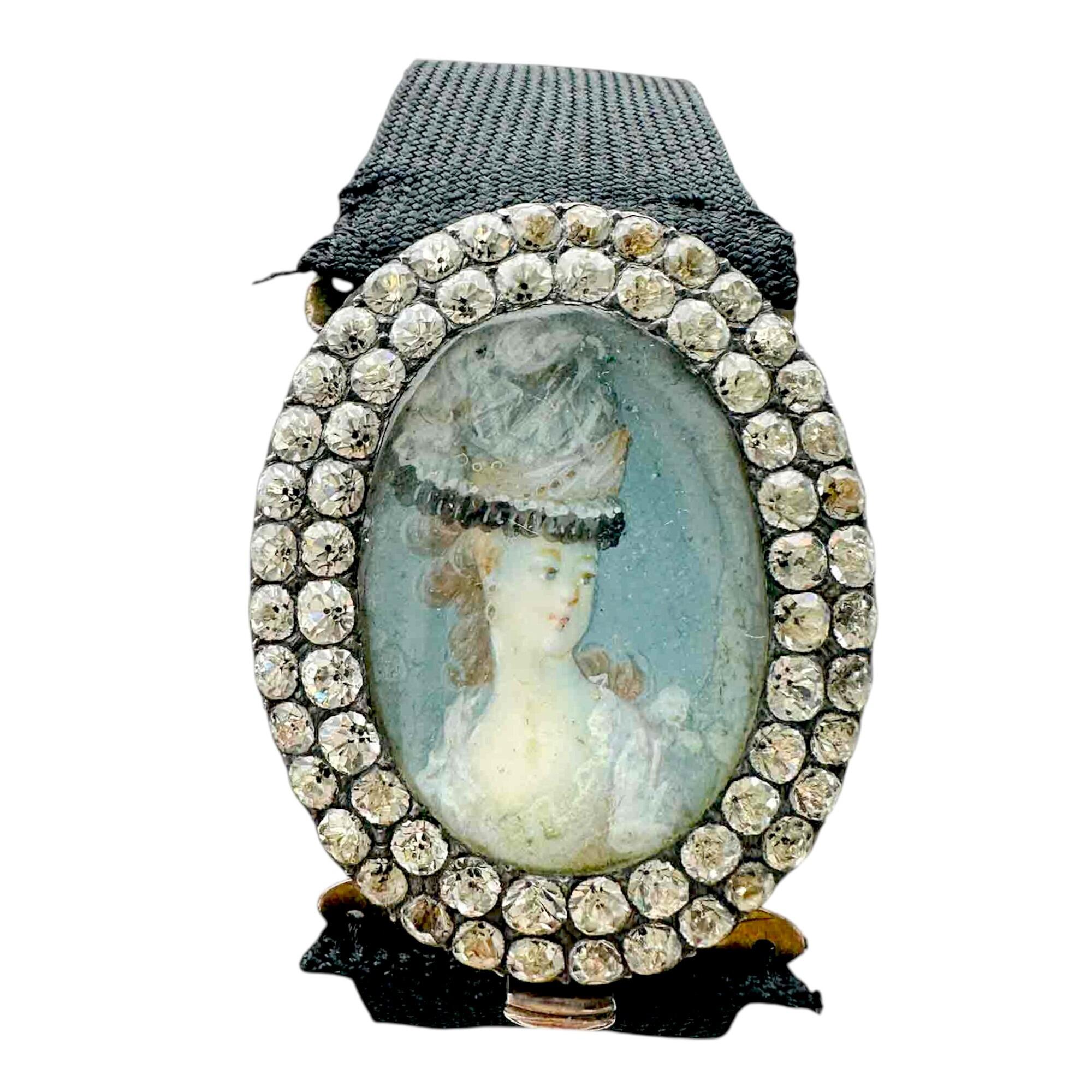 oval Marie Antoinette portrait with double paste stone frame on bracelet with white background