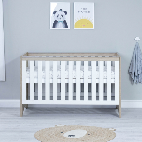 White and 2024 oak cot