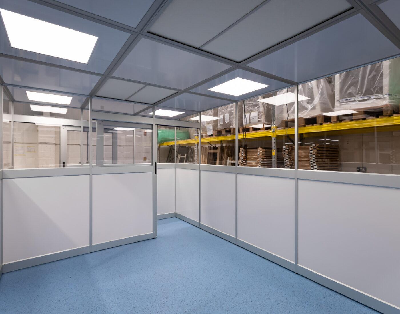 Monmouth modular cleanroom interior during installation, HEPA ceiling and gowning airlock
