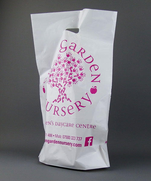 medium white plastic carrier bag, printed in magenta with punche