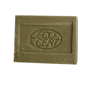 A rectangular bar of olive green soap imprinted with ECOCERT