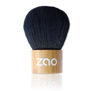 kabuki brush with light bamboo wood handle and black synthetic hair label shows Zao
