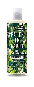a clear plastic bottle and cap, decorated label with graphic images of  green hemp leaves and cream flowers. Label shows faith in nature hemp and meadowfoam conditioner.