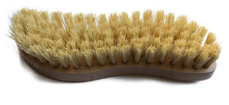 scrubbing brush laying bristles up. Natural cream bristles.