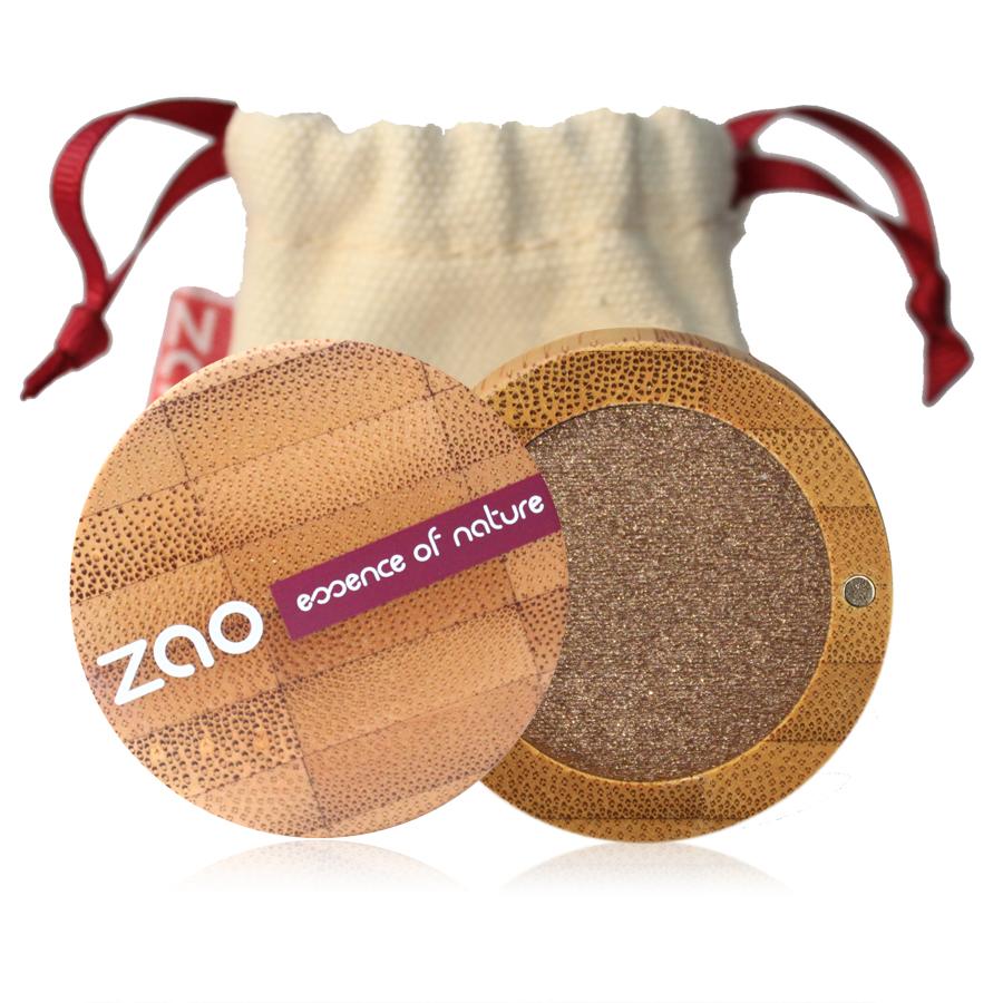pearly effect eyeshadow bronze colour in open bamboo pot, with natural cotton pouch behind, label shows zao