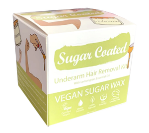 A square card box packaging in light green and white. Drawn images of arms and waxing jar on box. label shows sugar coated under arm hair removal kit.