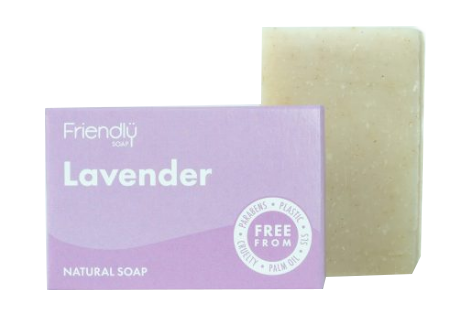 A lavender purple coloured card soap box with white text labelling showing friendly soap lavender natural soap. Rectangular natural cream bar of soap stood next to packaging.