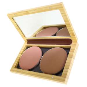 open bamboo make up case with mirrored lid. Two powdered make up refills inside.