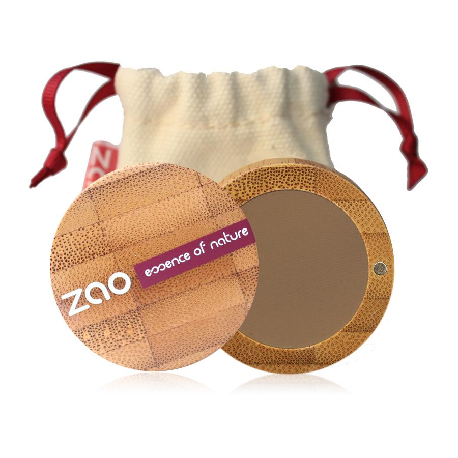 Blonde eyebrow powder shown in open bamboo compact case with natural cotton pouch shown behind, label shows Zao