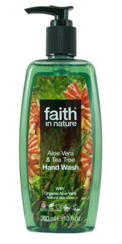 a clear pump dispenser bottle with black pump. Label shows photo image of aloe vera plants with faith in nature aloe vera and tea tree handwash.