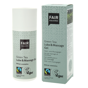 light green pump bottle with white lid next to light green box packaging showing green tea lube and massage gel. Label shows Fair squared.