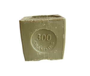 A chunky cube of olive green soap imprinted with 300g