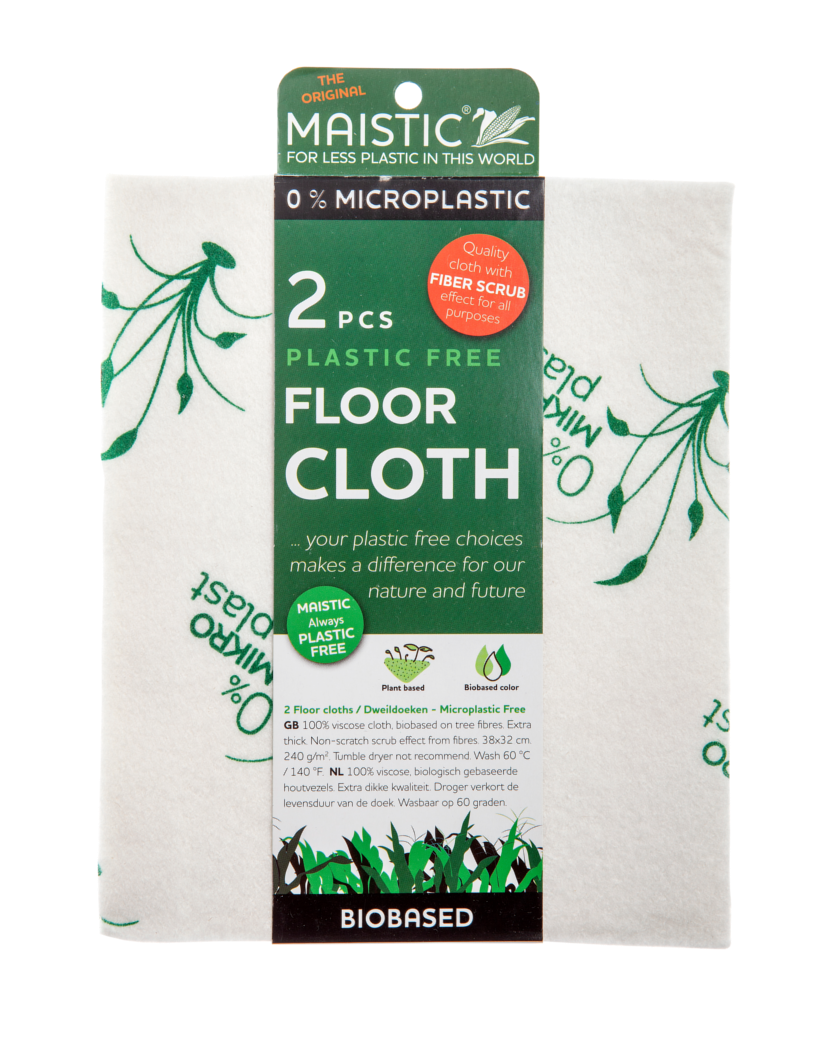 A white cloth with printed image of green plants. Packaged in a green card wrap showing maistic microplastic free floor cloths.