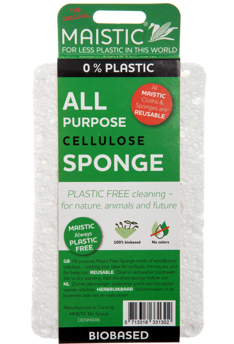 A white thin sponge packaged in a dark green card wrap. Label shows maistic plastic free all purpose sponge.