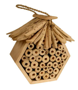 A natural hexagon wood bug box made up with round circular bamboo tubes. Drift wood roof.