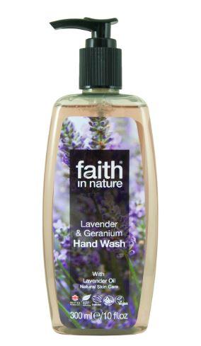 A clear plastic bottle with black pump dispenser. Photograph image on label of lavender flowers. Label shows faith in nature lavender and geranium hand wash.