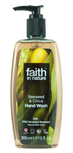A clear plastic bottle with black pump dispenser. Label has photo image of  seaweed with text showing faith in nature seaweed hand wash