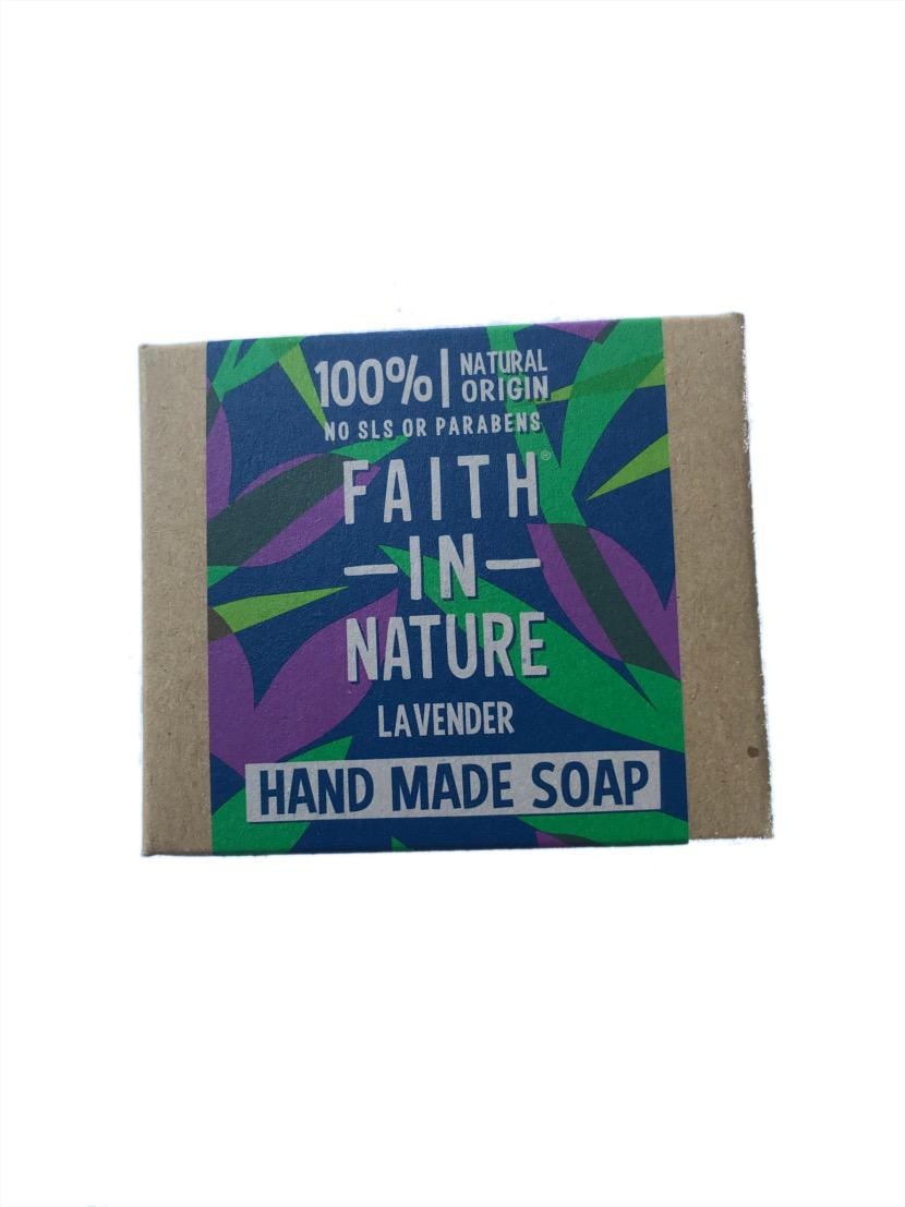 Rectangle natural brown soap box with blue, green and purple leaf paper label showing faith in nature lavender soap.