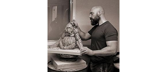 Matt Buckley working on clay sculpture