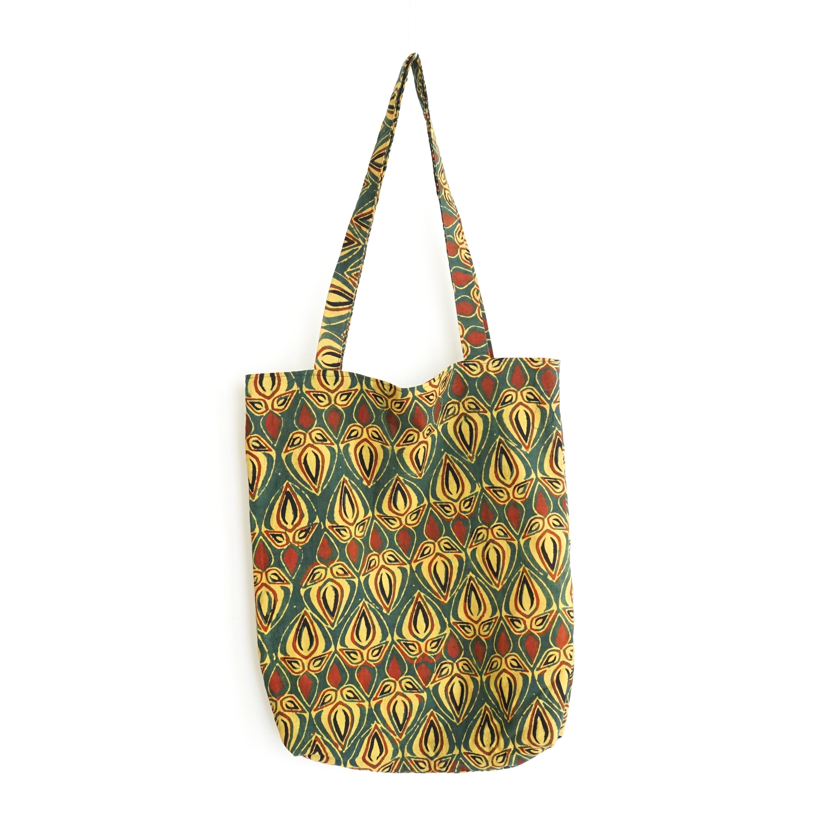 block printed cotton tote bag, green, yellow red bud, natural dye, lined with black cotton, closed