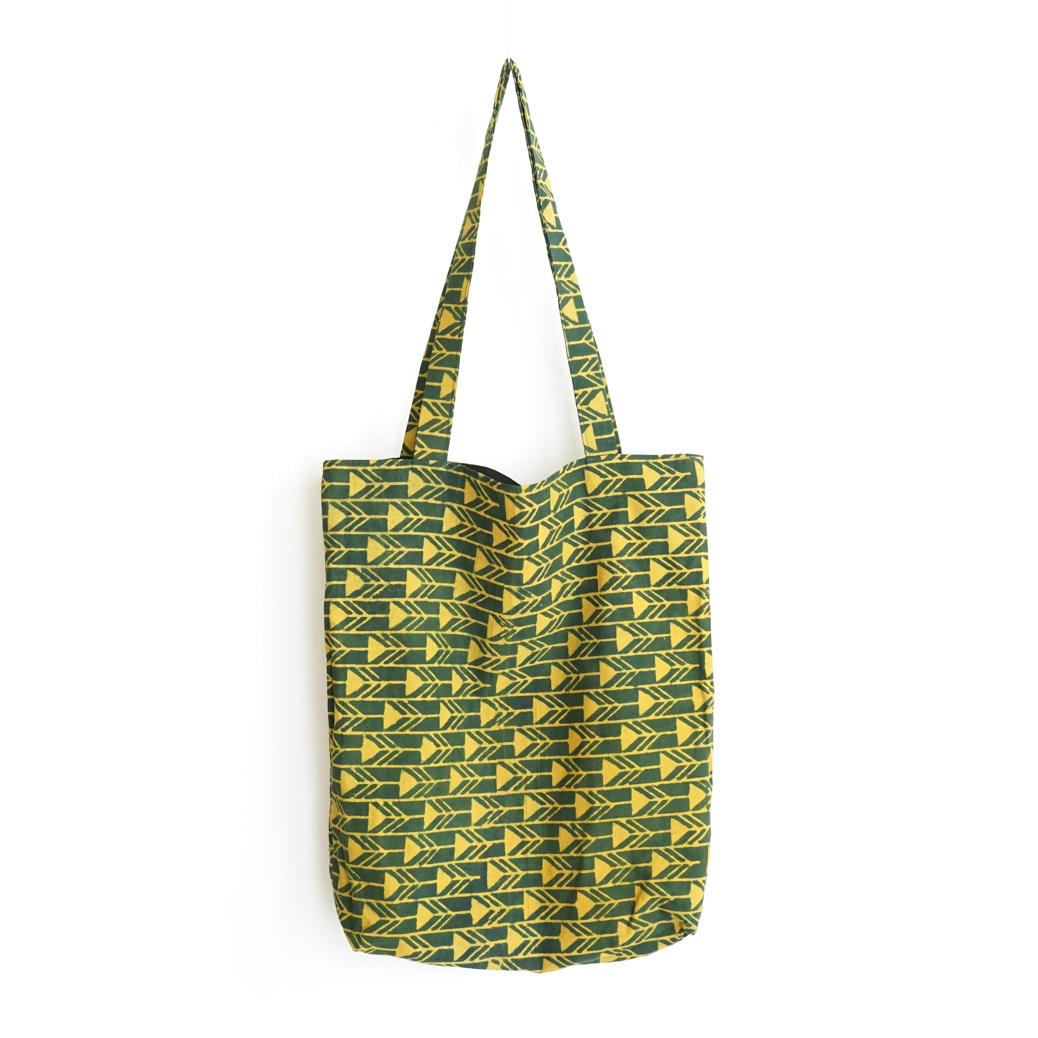 block printed cotton tote bag, green, yellow arrow design, natural dye, lined with black cotton, closed