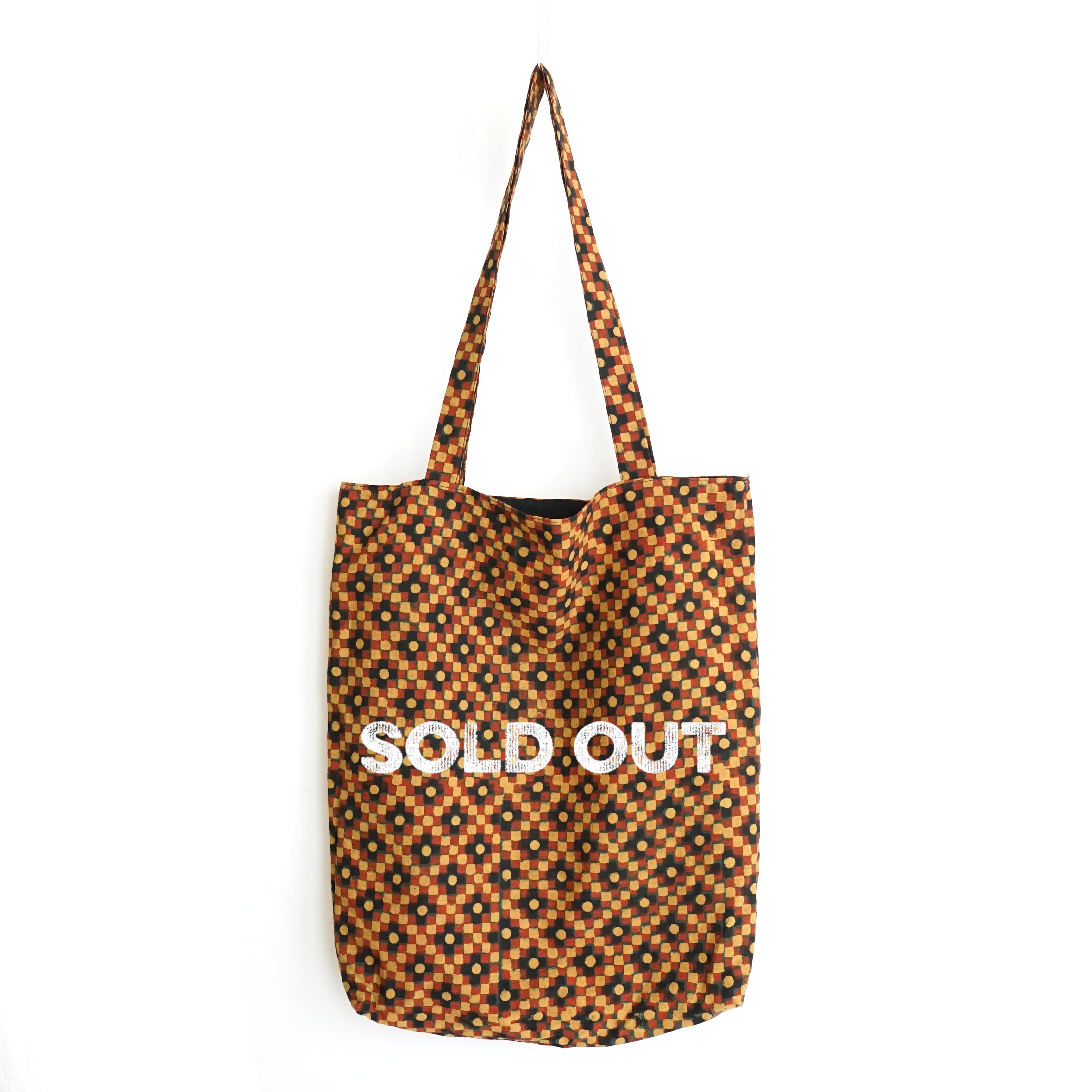 block printed tote bag, black, orange yellow green square design, lined with black cotton, closed