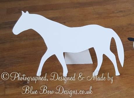 White horse shaped place card with backstand