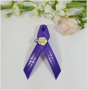 Memorial ribbon with flower purple