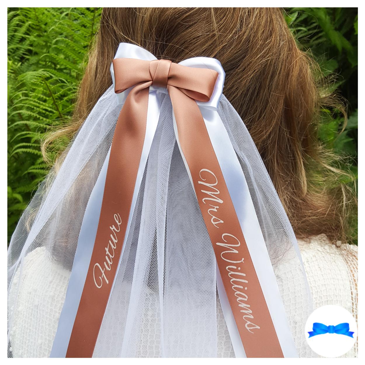 Rose gold and white hen party veil with white print on rose gold ribbon