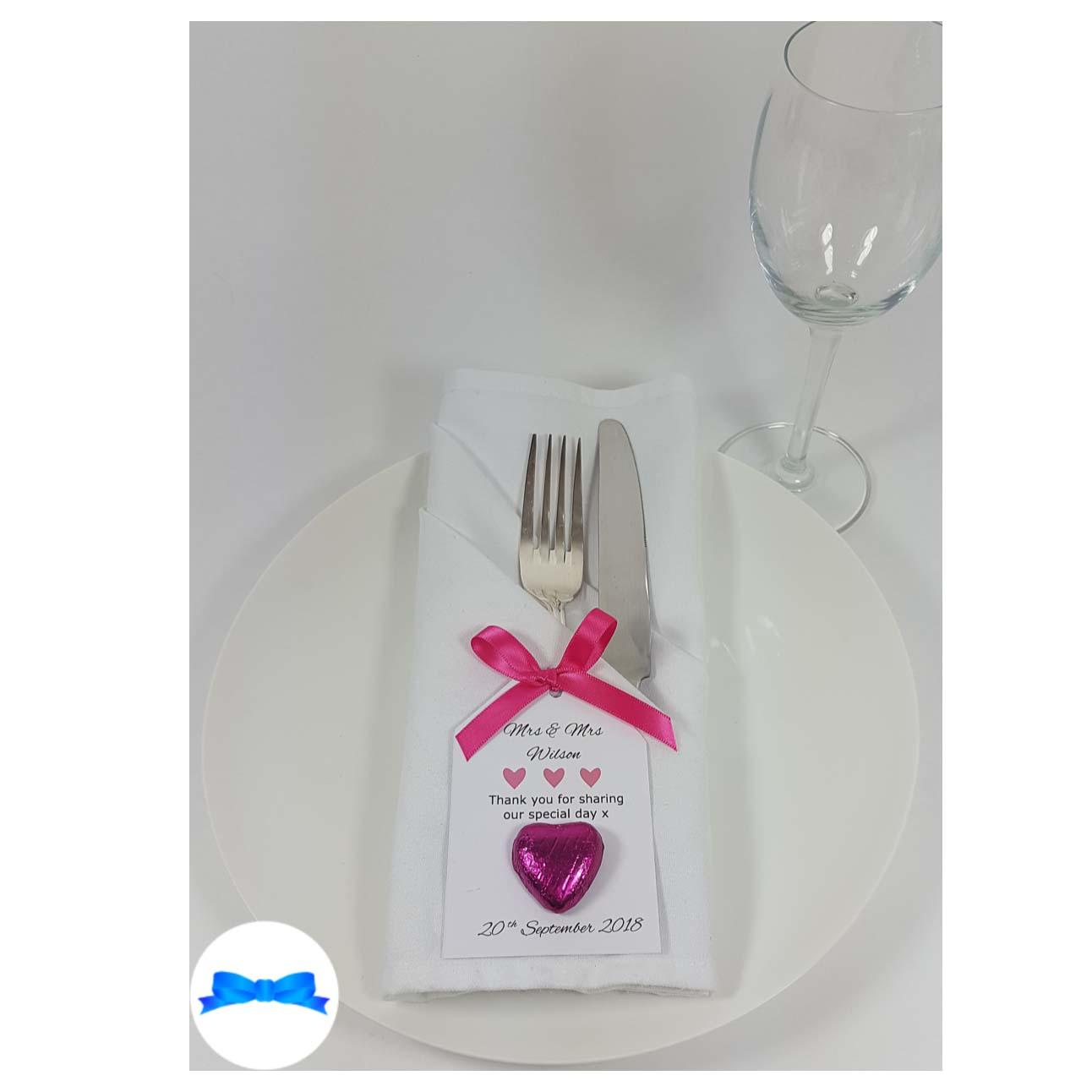 Wedding favour on a plate pink bow and favour