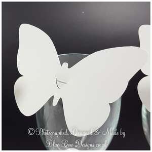 White linen butterfly wine glass place card