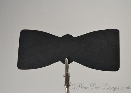 Black bow tie place card on own clip stand