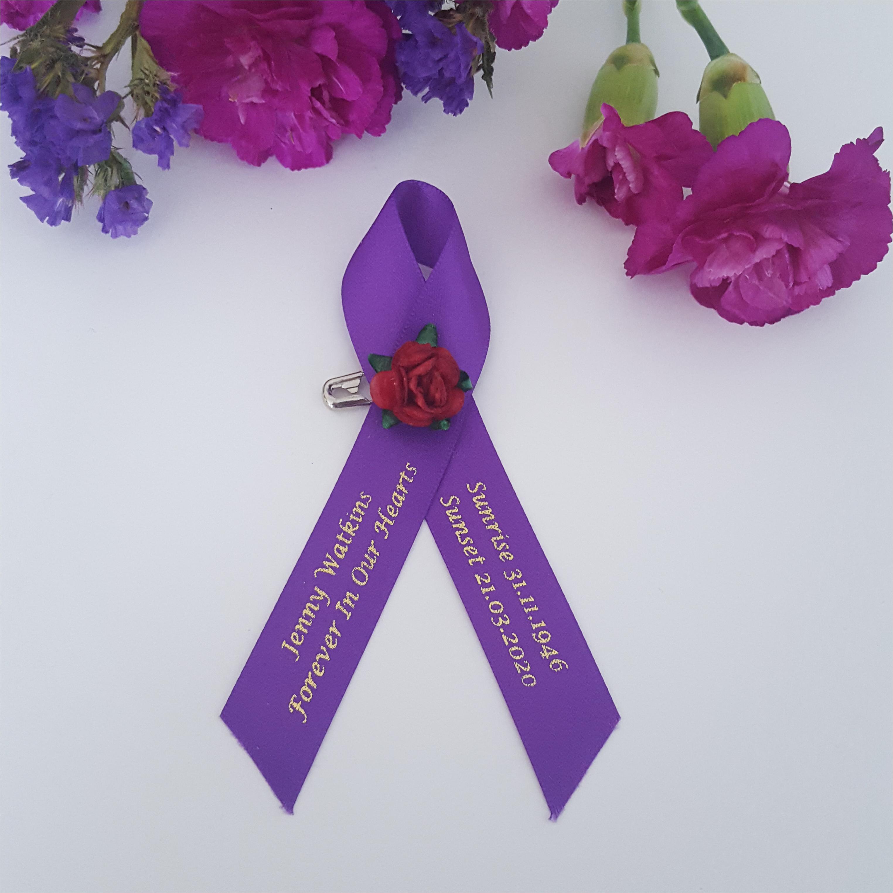 Red flower for funeral ribbon