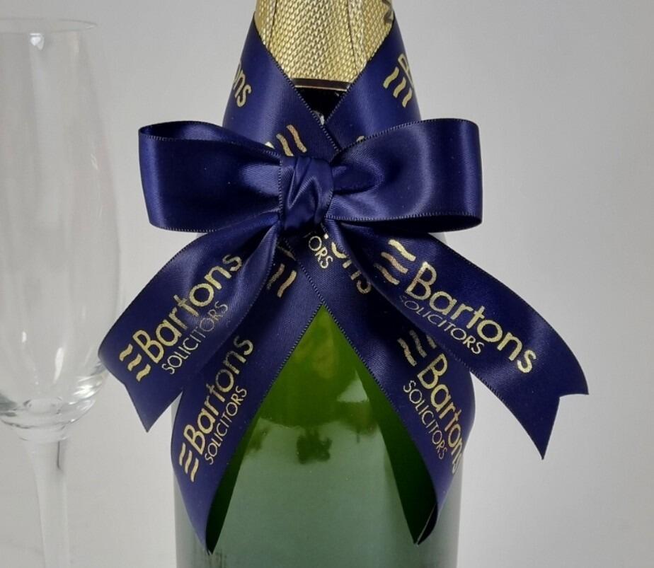 Navy blue and gold printed personalised bows with logo for bottles