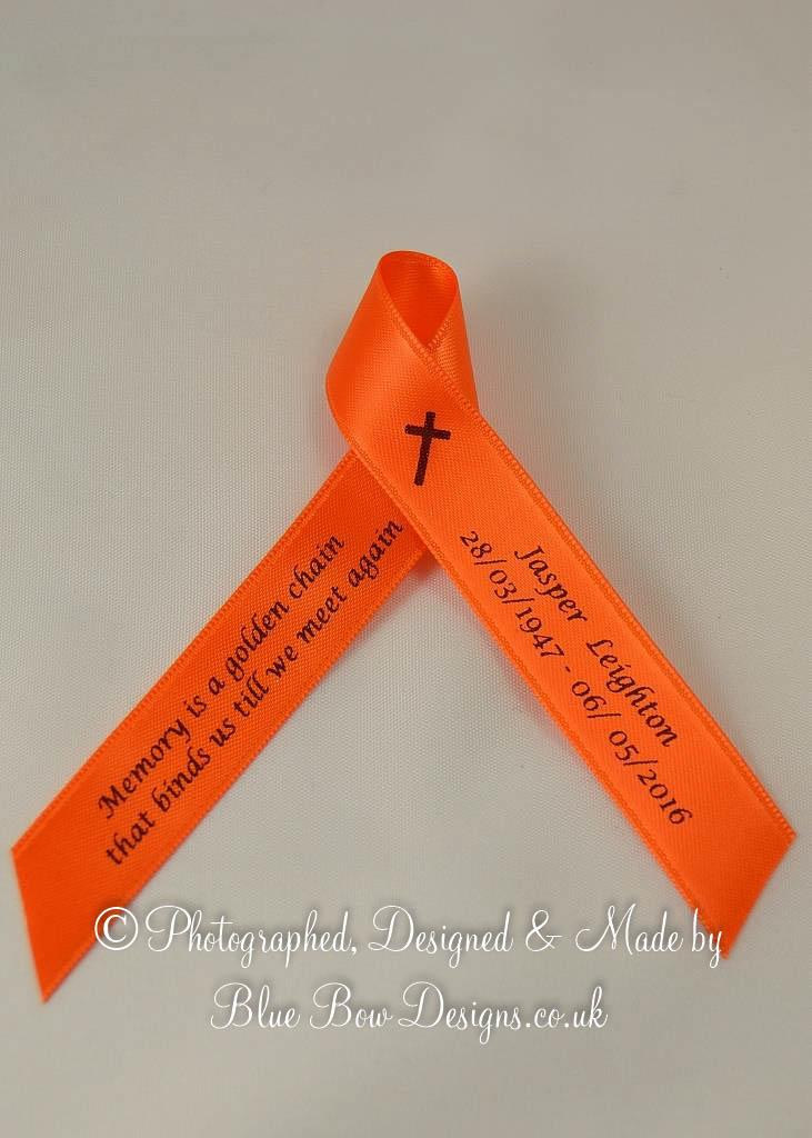 Orange memorial funeral ribbon