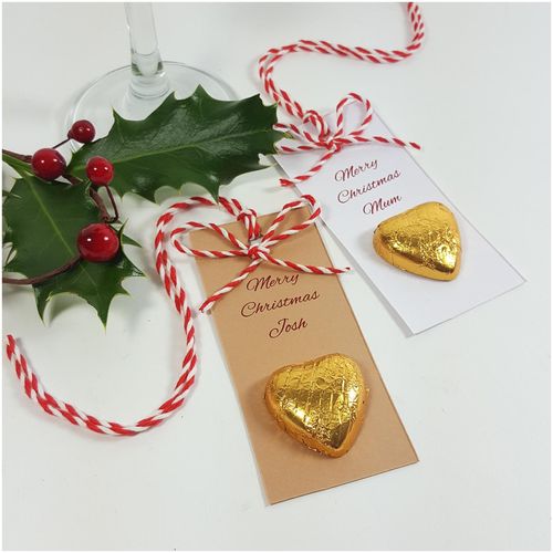 Christmas bakers twine place card with chocolate and bow for chocolate heart