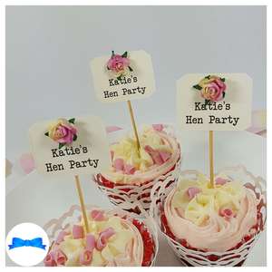 Hen party cupcake toppers with pink and cream roses