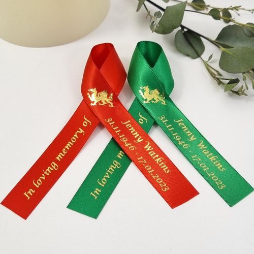 Welsh dragon funeral memorial ribbons. Red and green and gold welsh funeral favours