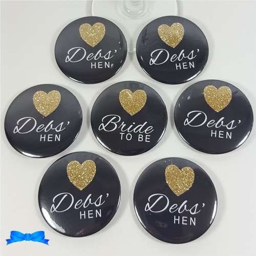 Black hen party badges with gold glitter hearts