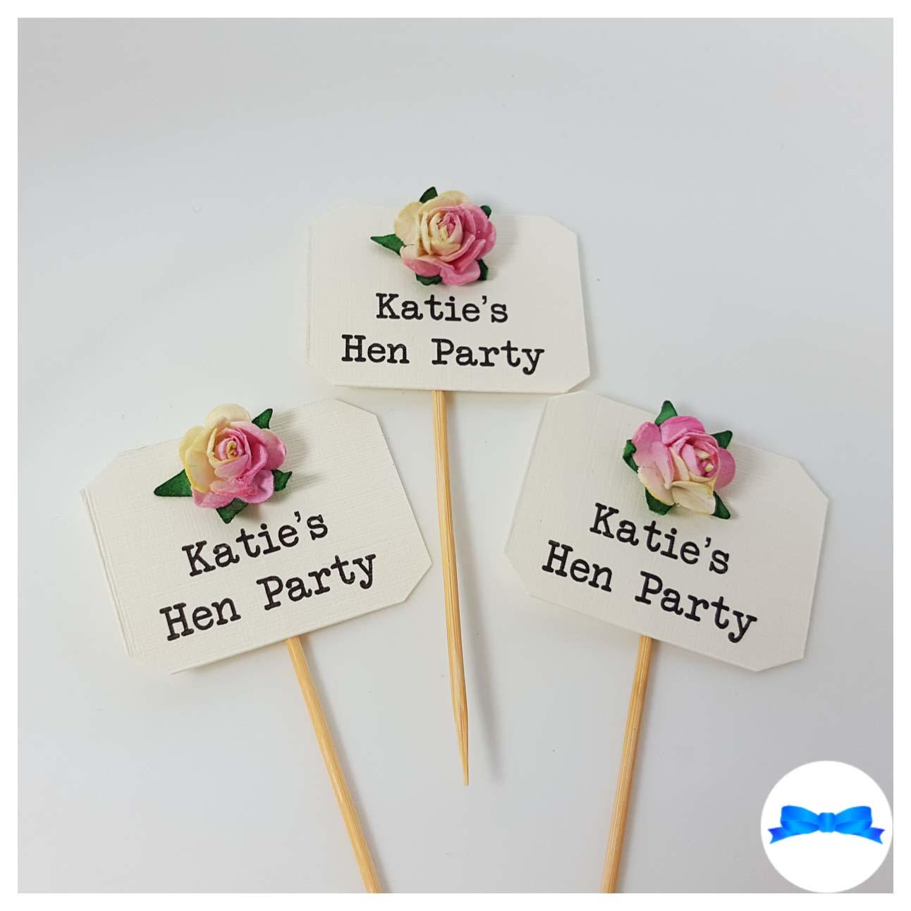 Hen party cupcake toppers with pink and cream roses