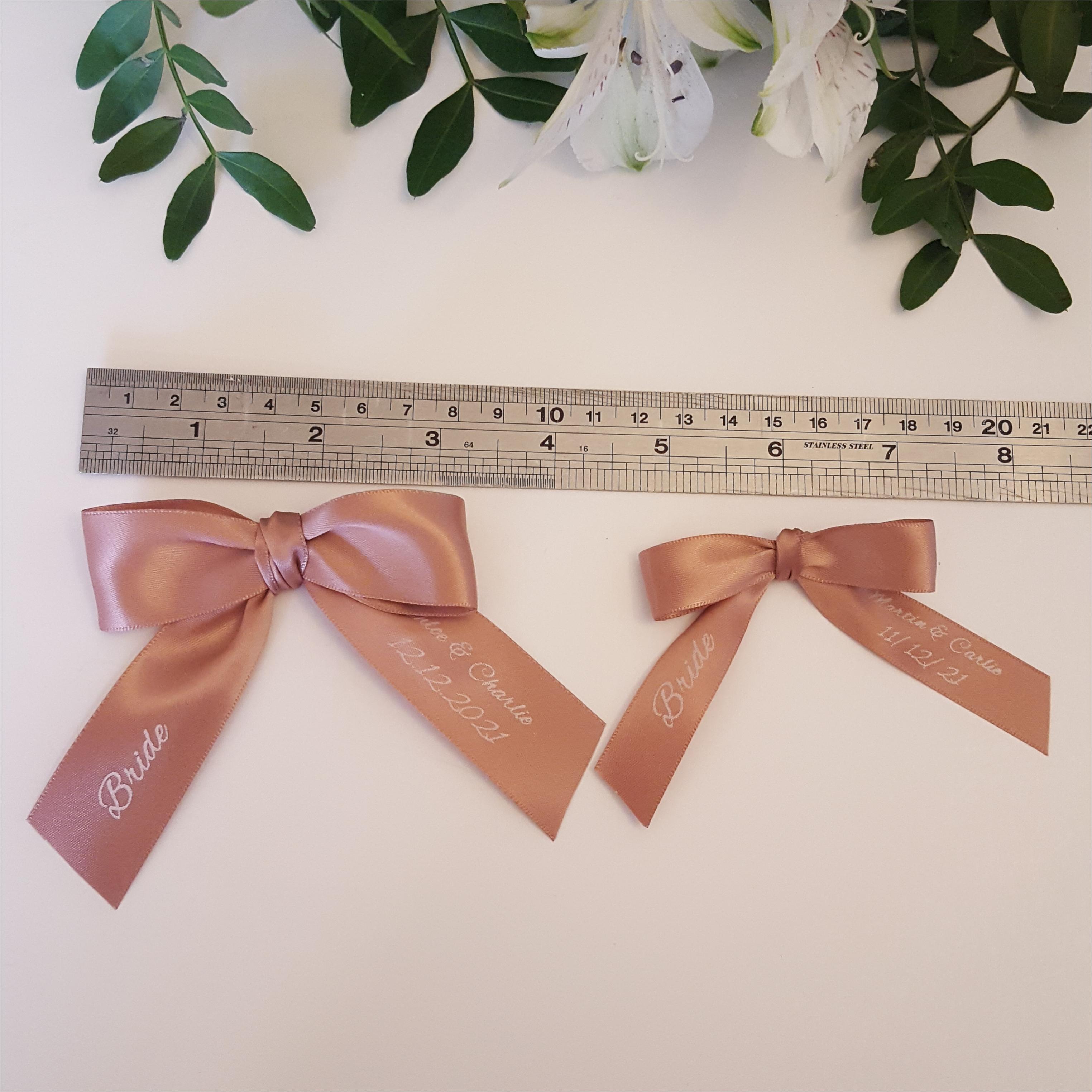Rose gold bows with guest names