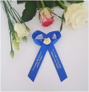 Funeral ribbon with paper tea rose