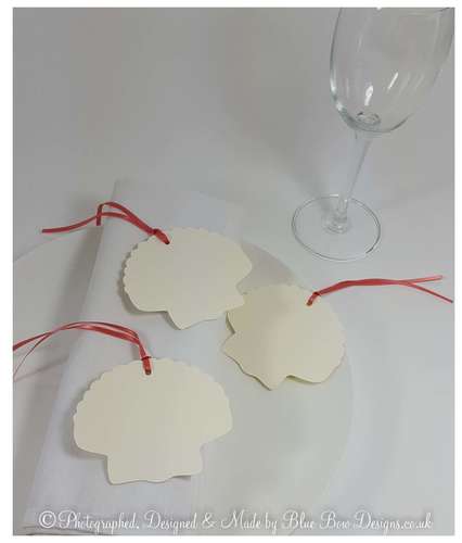 Shell shaped tags